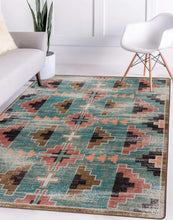 Load image into Gallery viewer, southwestern-inspired-blue-pink-geometric-area-rug-in-modern-white-room