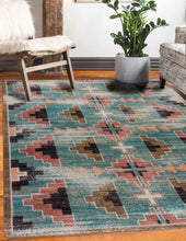 Load image into Gallery viewer, southwestern-inspired-blue-pink-geometric-area-rug-in-farmhouse-living-room-with-rustic-fur-chair