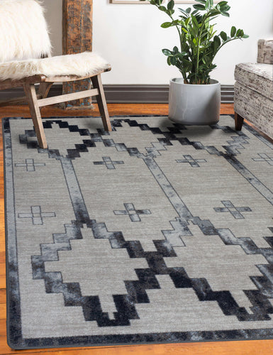 gray-and-marble-geometric-area-rug-in-farmhouse-living-room-with-rustic-fur-chair