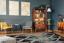 Load image into Gallery viewer, brown-and-teal-geometric-area-rug-in-trendy-gray-living-room
